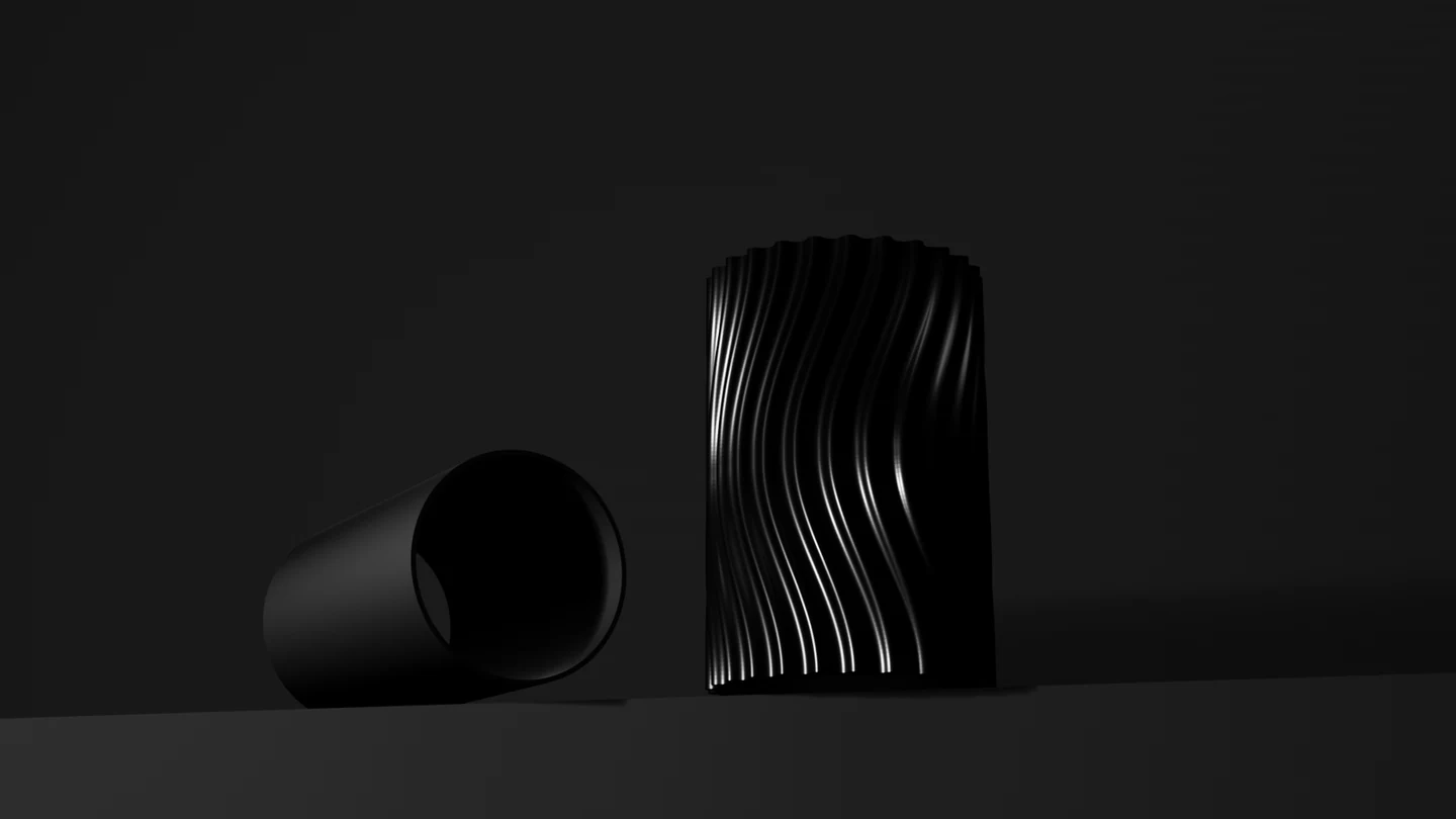 Black TITAN Wave skin beside its PA6-CF core